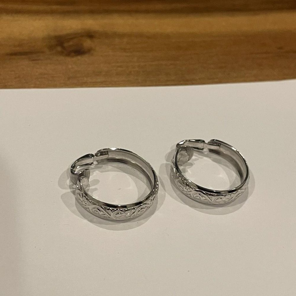 Signed L.H. Segal Silver Tone Clip On Hoop Earrings Scroll Pattern